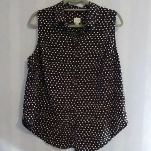 Black and white polka dotted sleeveless blouse